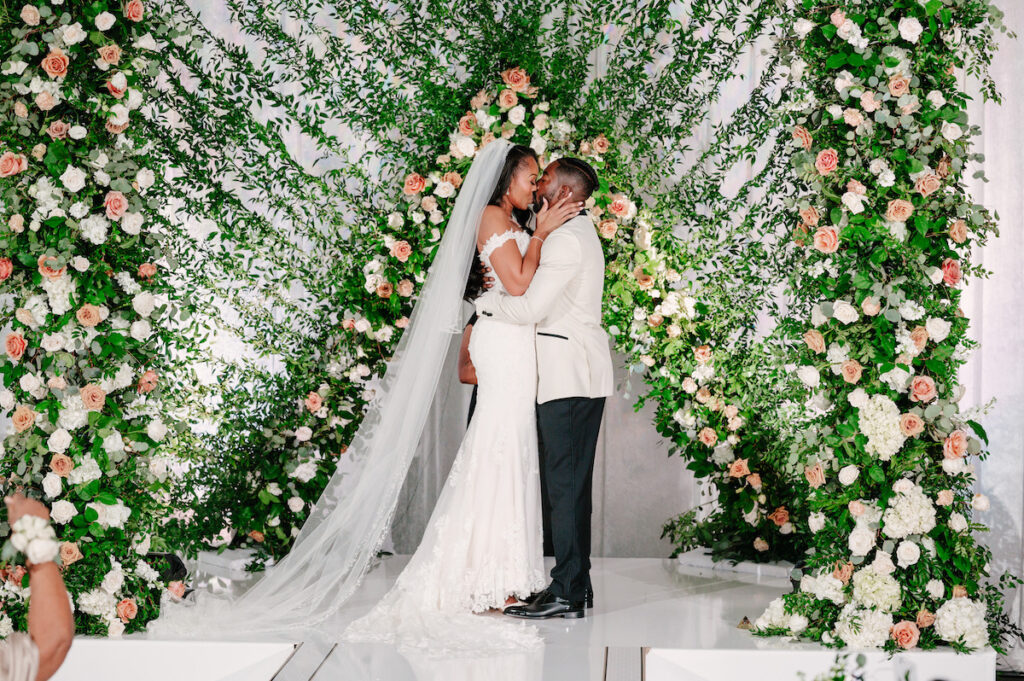 Luxe Basketball Court wedding includes contemporary designs, custom floral decor, and meaningful symbolism and numerology throughout.