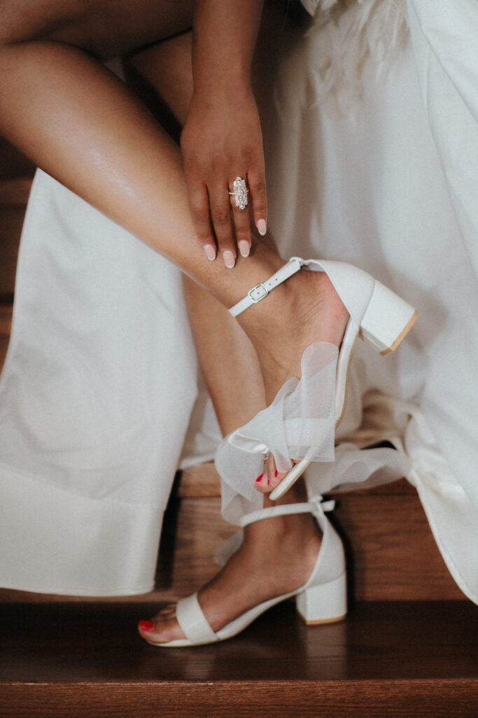 Bride-to-be Melissa Williams of Luxe Collection Bridal wore her own custom gown in an intimate at-home Old Hollywood engagement session.