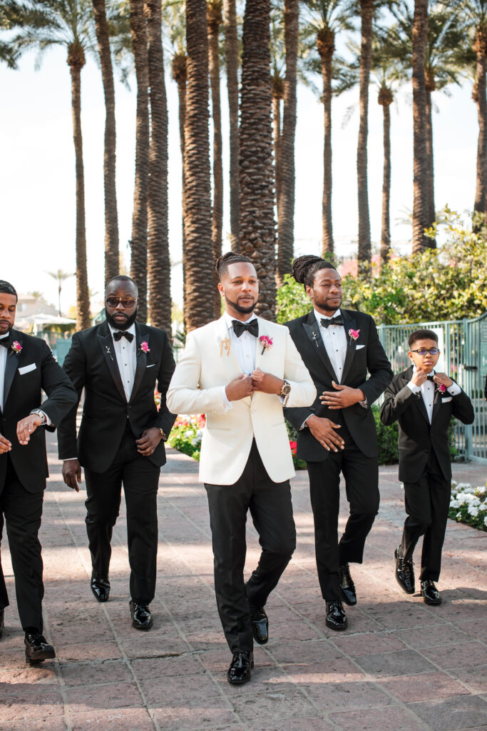 This outdoor wedding held at the beautiful Hyatt Regency Resort in Scottsdale, AZ, had timelessly chic details and perfectly pink surprises.