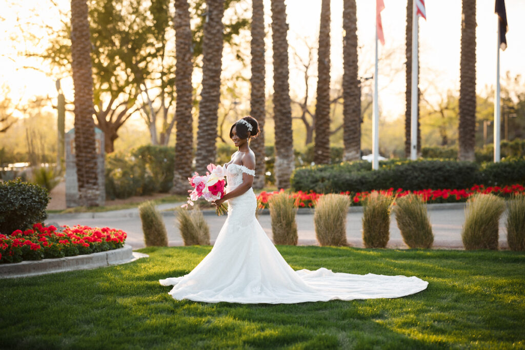 This outdoor wedding held at the beautiful Hyatt Regency Resort in Scottsdale, AZ, had timelessly chic details and perfectly pink surprises.