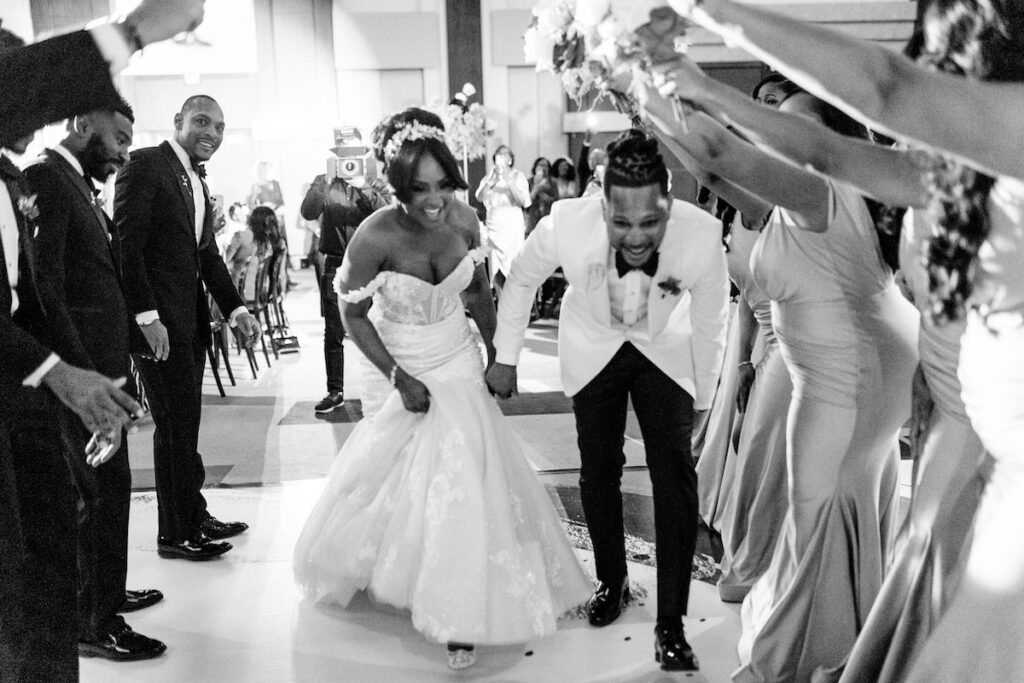 This outdoor wedding held at the beautiful Hyatt Regency Resort in Scottsdale, AZ, had timelessly chic details and perfectly pink surprises.