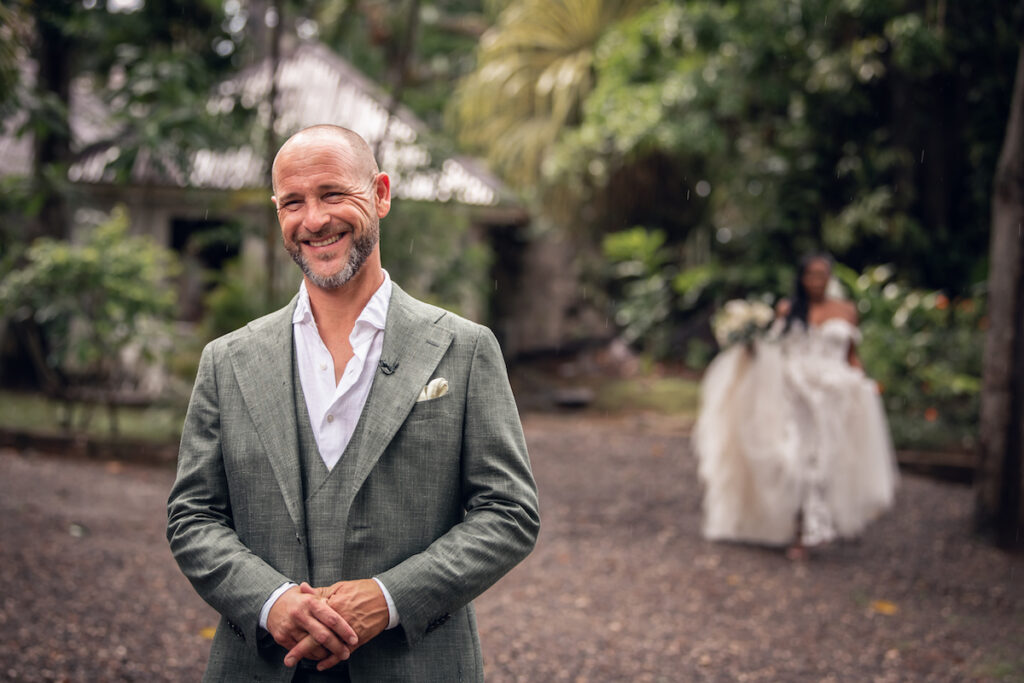 Glam destination wedding at The Wharf House in Montego Bay, Jamaica, features adorable wedding children and sweet island vibes.