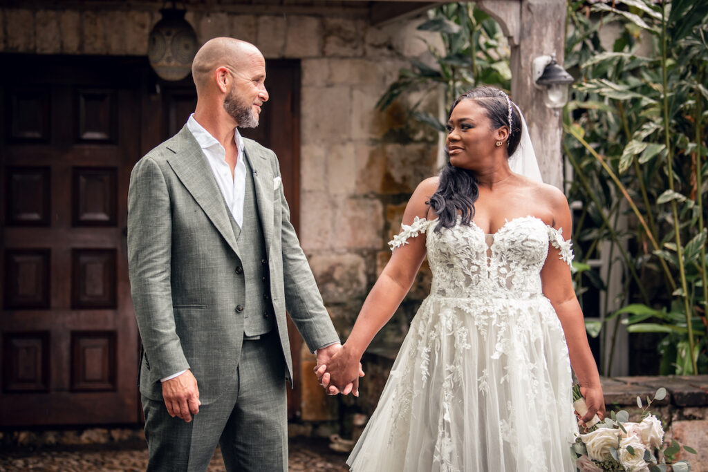 Glam destination wedding at The Wharf House in Montego Bay, Jamaica, features adorable wedding children and sweet island vibes.