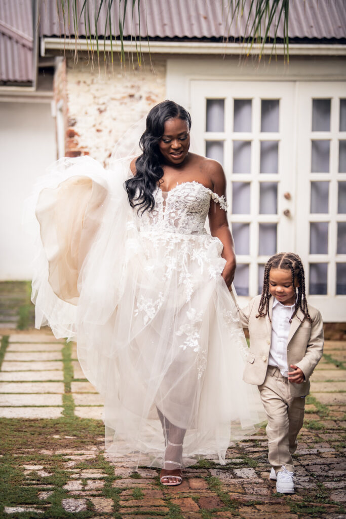 Glam destination wedding at The Wharf House in Montego Bay, Jamaica, features adorable wedding children and sweet island vibes.