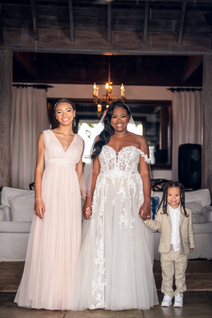 Glam destination wedding at The Wharf House in Montego Bay, Jamaica, features adorable wedding children and sweet island vibes.