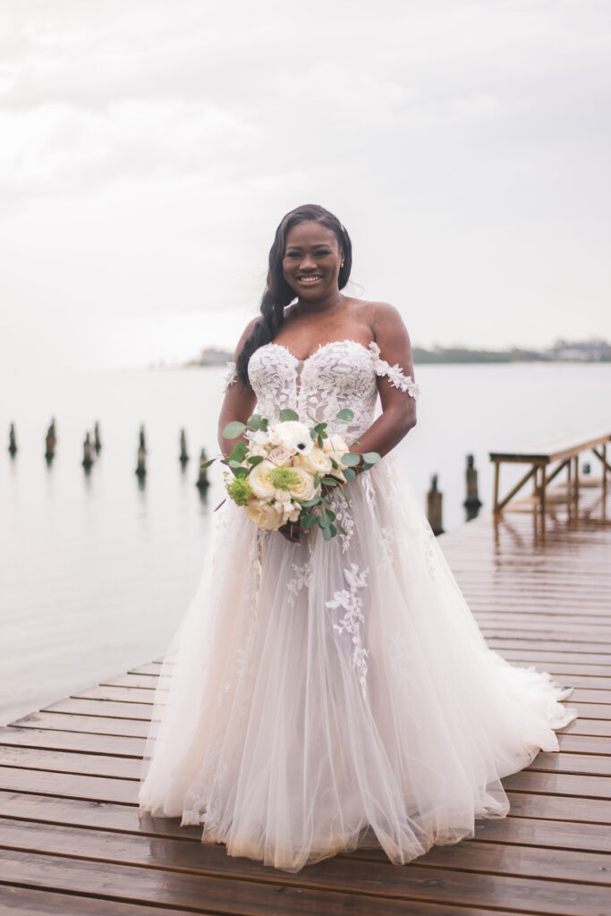 Glam destination wedding at The Wharf House in Montego Bay, Jamaica, features adorable wedding children and sweet island vibes.