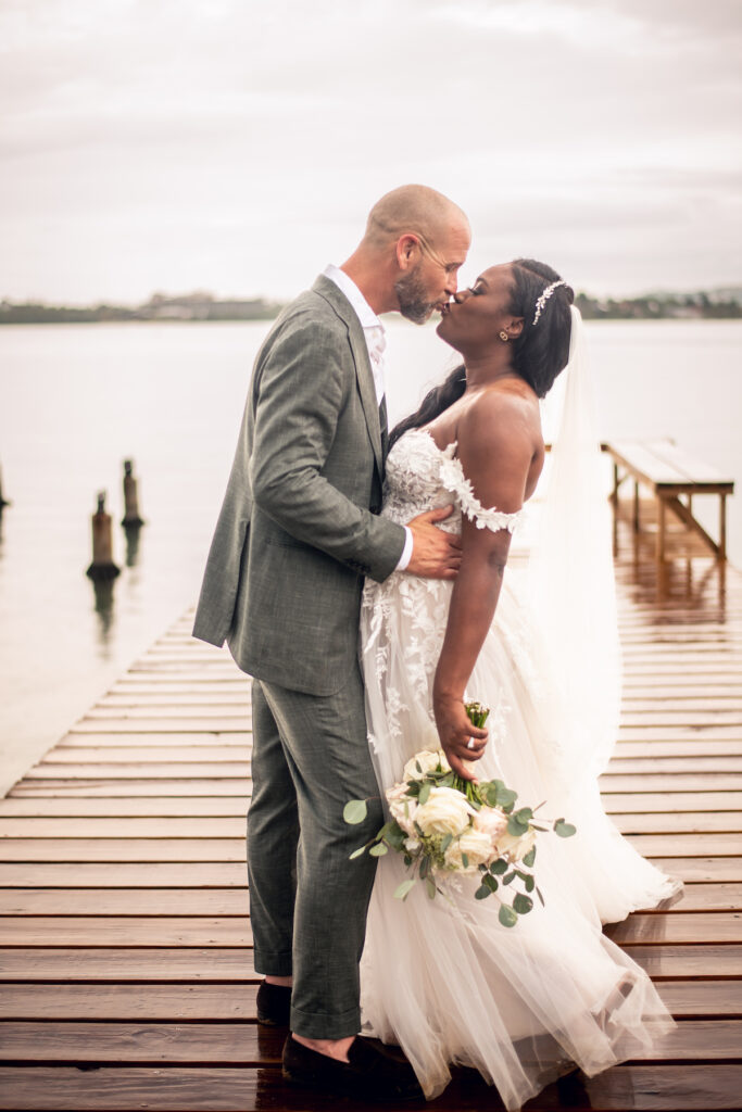 Glam destination wedding at The Wharf House in Montego Bay, Jamaica, features adorable wedding children and sweet island vibes.