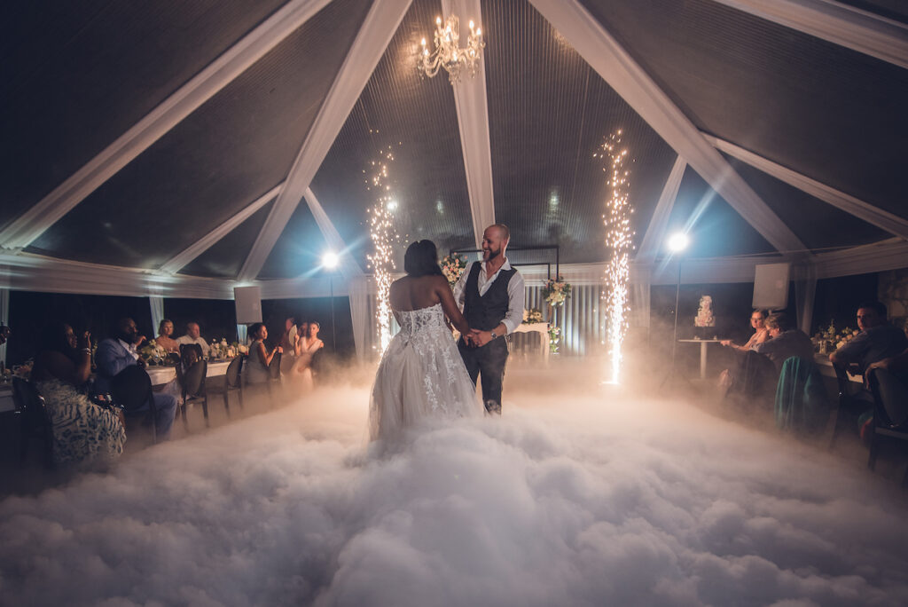 Glam destination wedding at The Wharf House in Montego Bay, Jamaica, features adorable wedding children and sweet island vibes.