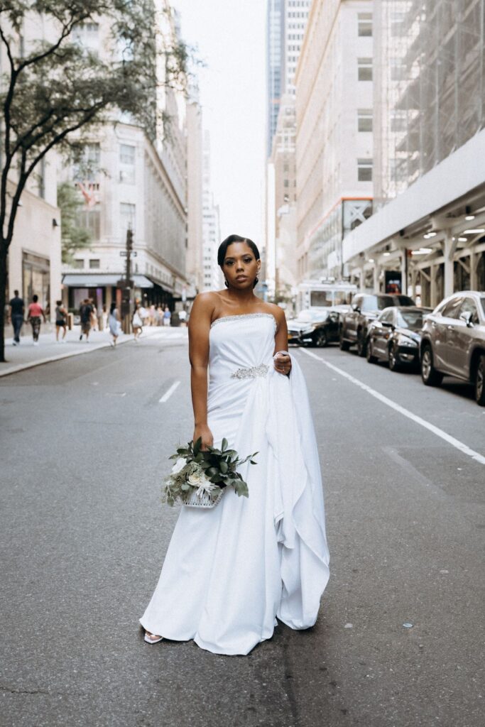 Take a look at the beautiful moments captured during an unplugged & intimate wedding on the NYC skyline with Jaleesa and Eric.