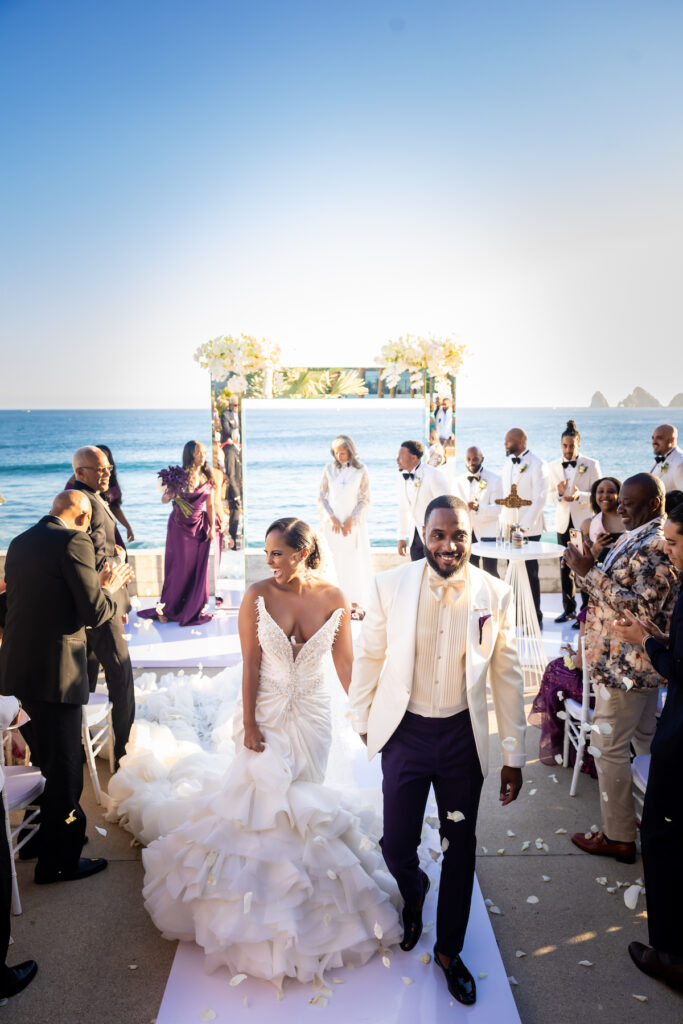 Tristian and Harold’s luxurious destination wedding in Cabo featured top-notch entertainment, glamorous custom fashion, and stunning views!