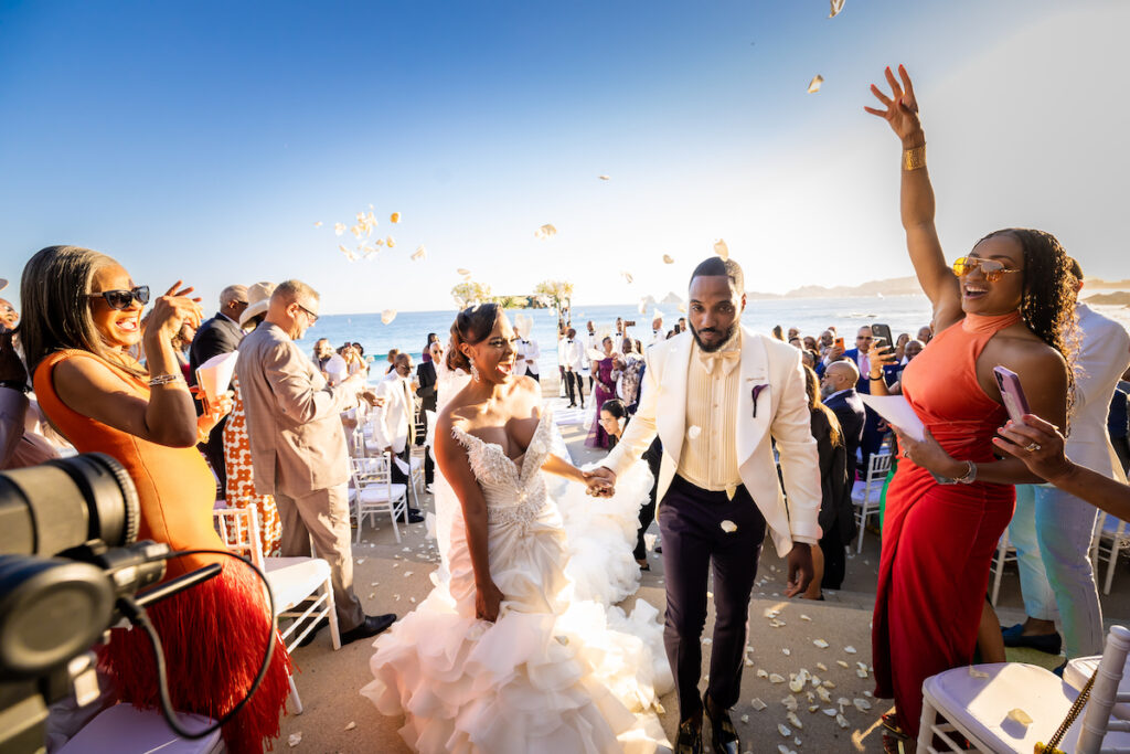 Tristian and Harold’s luxurious destination wedding in Cabo featured top-notch entertainment, glamorous custom fashion, and stunning views!