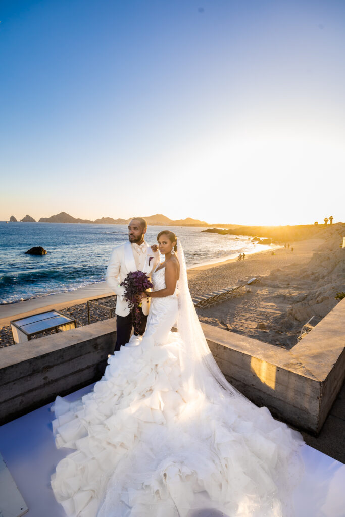 Tristian and Harold’s luxurious destination wedding in Cabo featured top-notch entertainment, glamorous custom fashion, and stunning views!