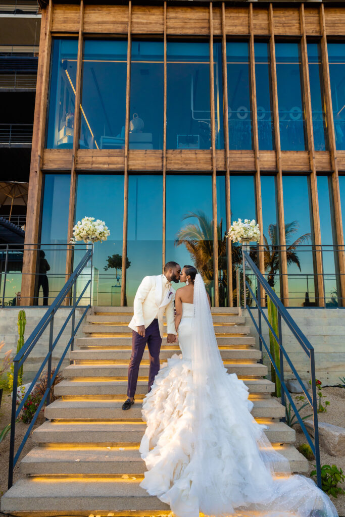 Tristian and Harold’s luxurious destination wedding in Cabo featured top-notch entertainment, glamorous custom fashion, and stunning views!