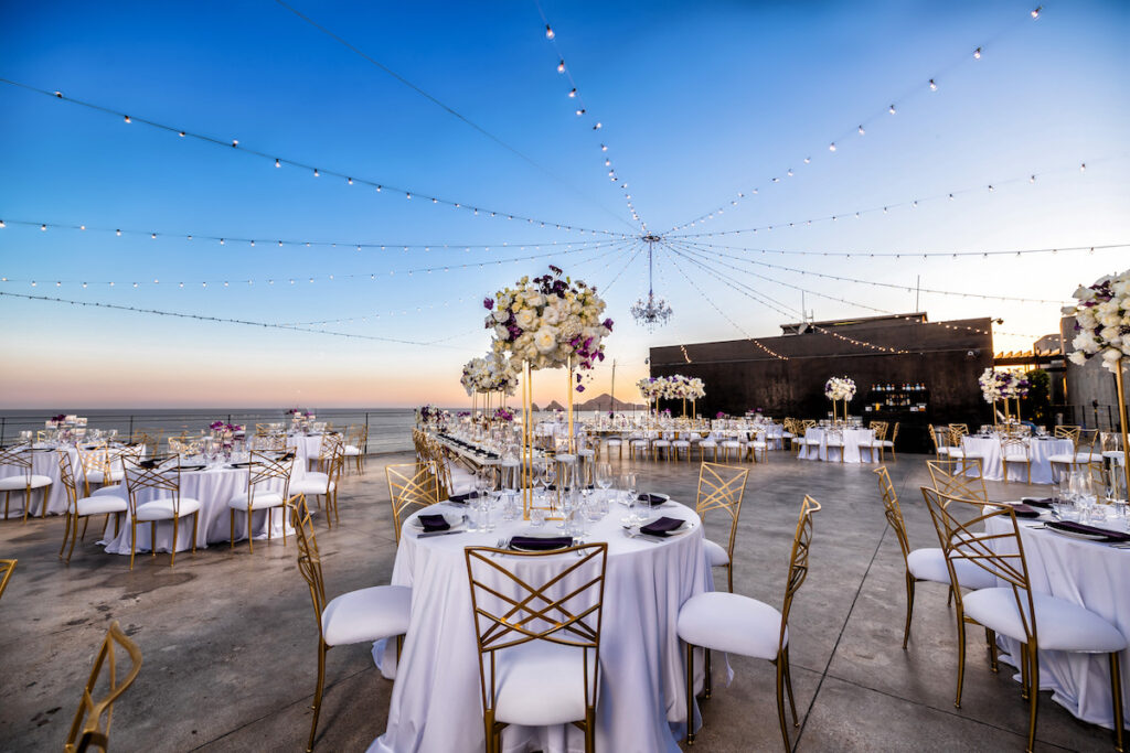 Tristian and Harold’s luxurious destination wedding in Cabo featured top-notch entertainment, glamorous custom fashion, and stunning views!