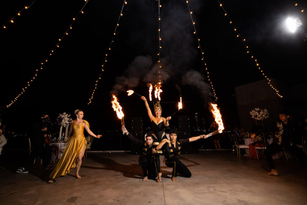 Tristian and Harold’s luxurious destination wedding in Cabo featured top-notch entertainment, glamorous custom fashion, and stunning views!