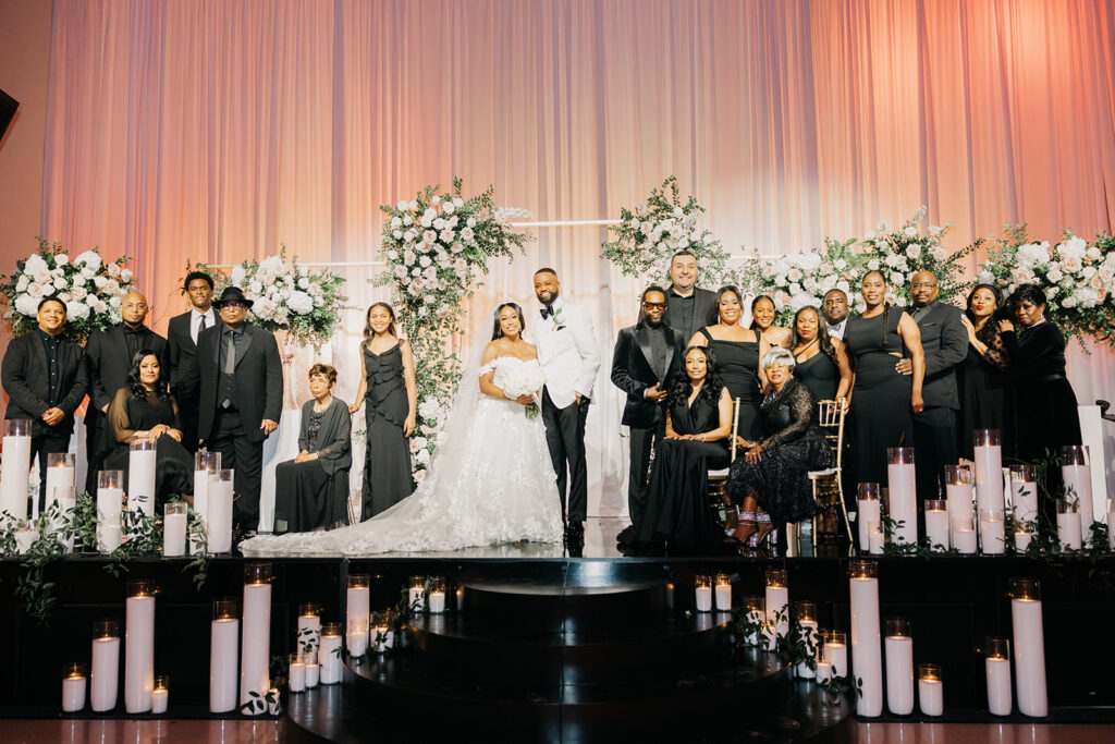 This gorgeous black tie wedding featured epic wedding day performances from music royalty and comedy legends.