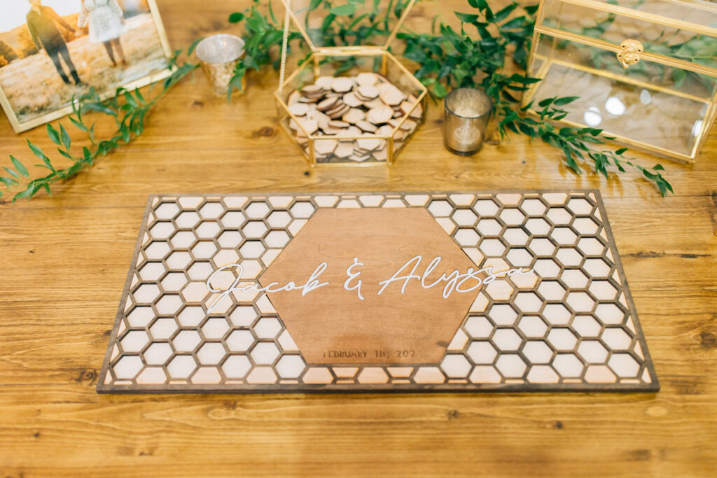 This wedding at Koury Farms in Georgia is perfect for the edgy boho bride with white flowers, greenery, and elevated gold accents.