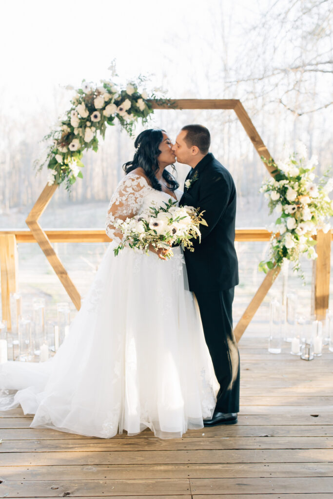 This wedding at Koury Farms in Georgia is perfect for the edgy boho bride with white flowers, greenery, and elevated gold accents.