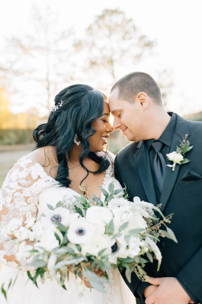 This wedding at Koury Farms in Georgia is perfect for the edgy boho bride with white flowers, greenery, and elevated gold accents.