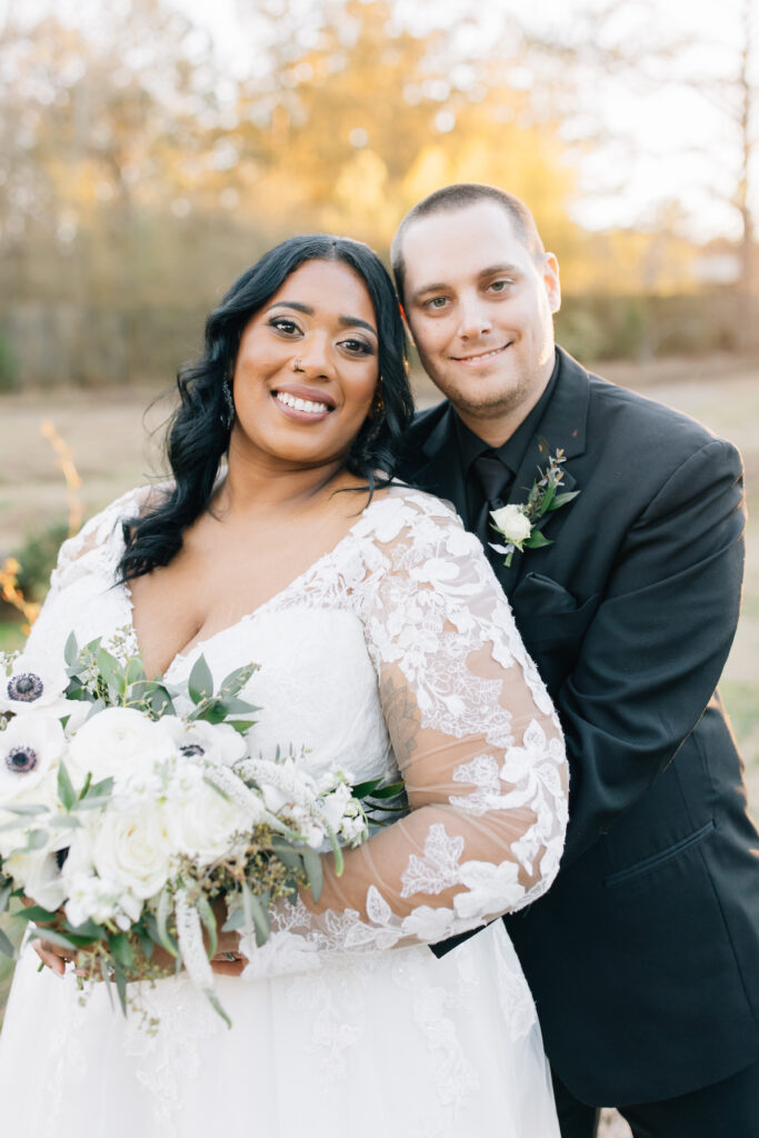 This wedding at Koury Farms in Georgia is perfect for the edgy boho bride with white flowers, greenery, and elevated gold accents.