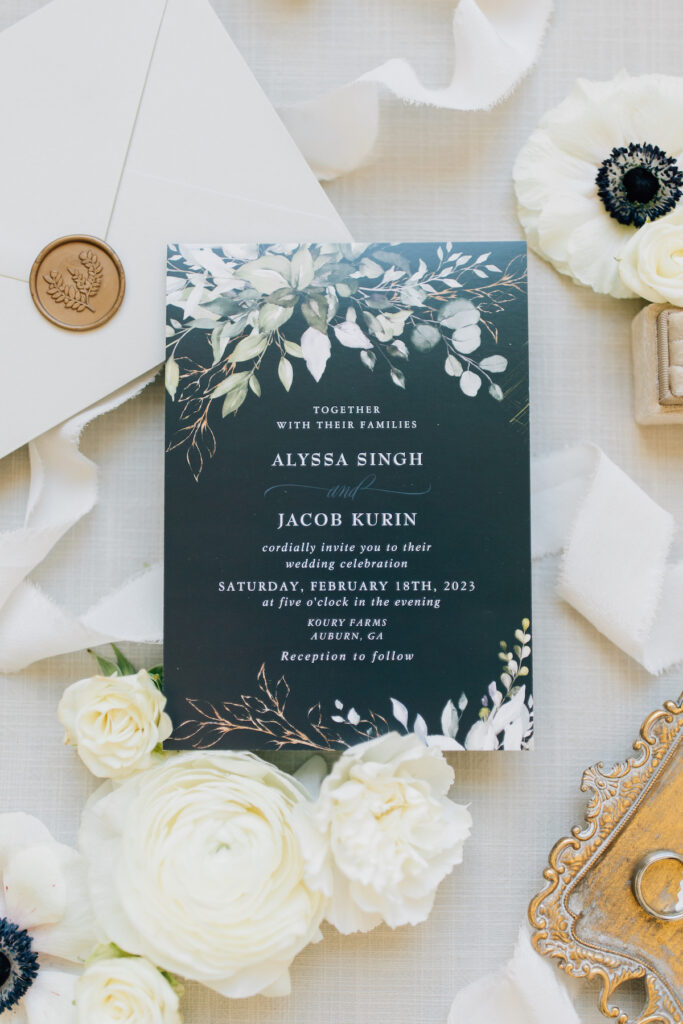 This wedding at Koury Farms in Georgia is perfect for the edgy boho bride with white flowers, greenery, and elevated gold accents.