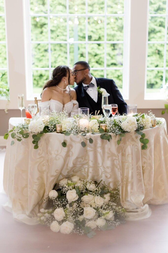 Haley and Jordan's elegant wedding at the Pen Ryn Mansion features lush greenery, personal details, and Jamaican cultural elements.