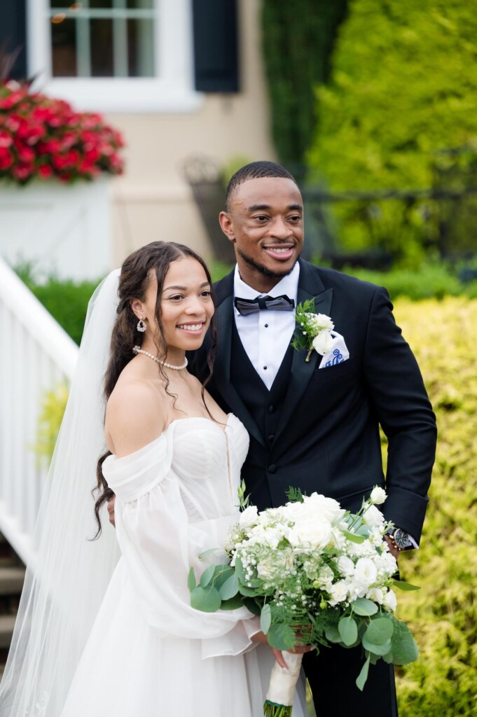 Haley and Jordan's elegant wedding at the Pen Ryn Mansion features lush greenery, personal details, and Jamaican cultural elements.