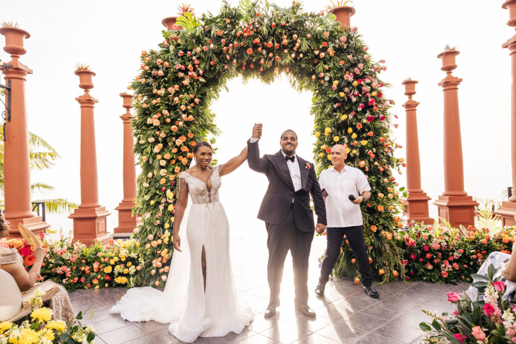 This luxe wedding in paradise featured vibrant details, stunning views, and the most romantic wedding dress by Ese Azenabor.