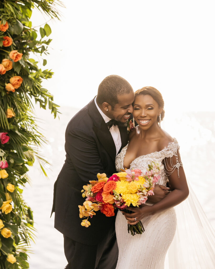 This luxe wedding in paradise featured vibrant details, stunning views, and the most romantic wedding dress by Ese Azenabor.