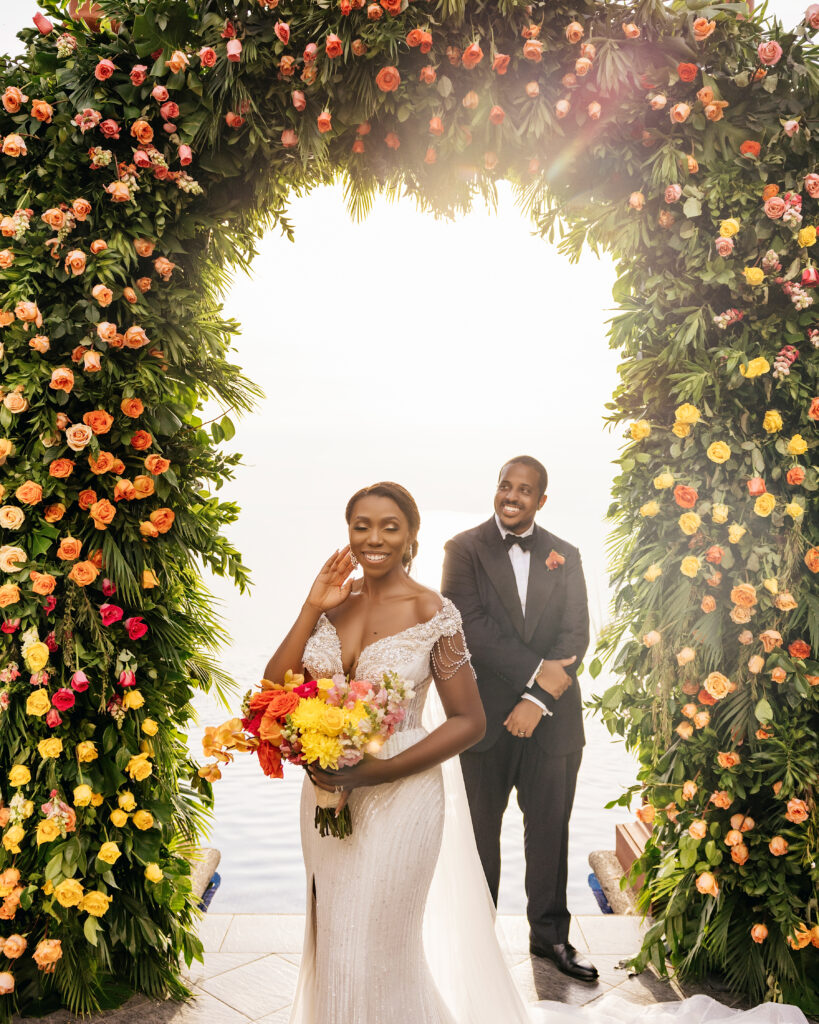 This luxe wedding in paradise featured vibrant details, stunning views, and the most romantic wedding dress by Ese Azenabor.