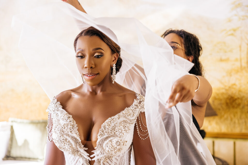 This luxe wedding in paradise featured vibrant details, stunning views, and the most romantic wedding dress by Ese Azenabor.