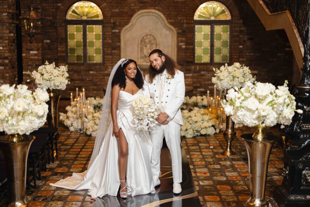 From their holiday party meet cute to partying down the aisle, Dawntavia and Fernando's luxurious Miami wedding was the day of their dreams!