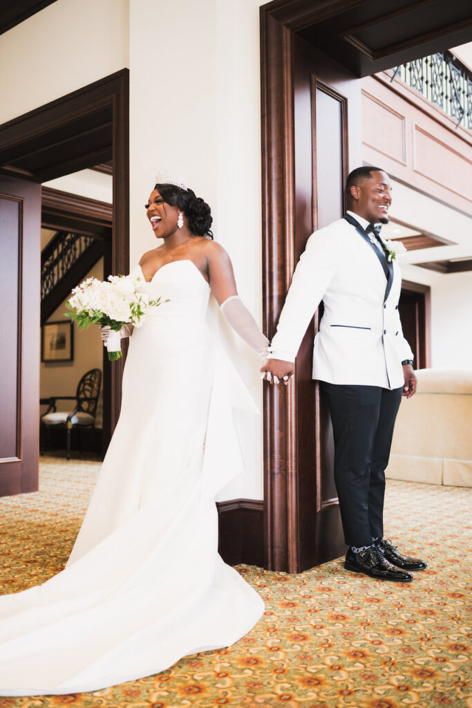 Milan and Mischael's traditional summer wedding in Florida featured an elegant, polished style and a classy black-and-white color palette!