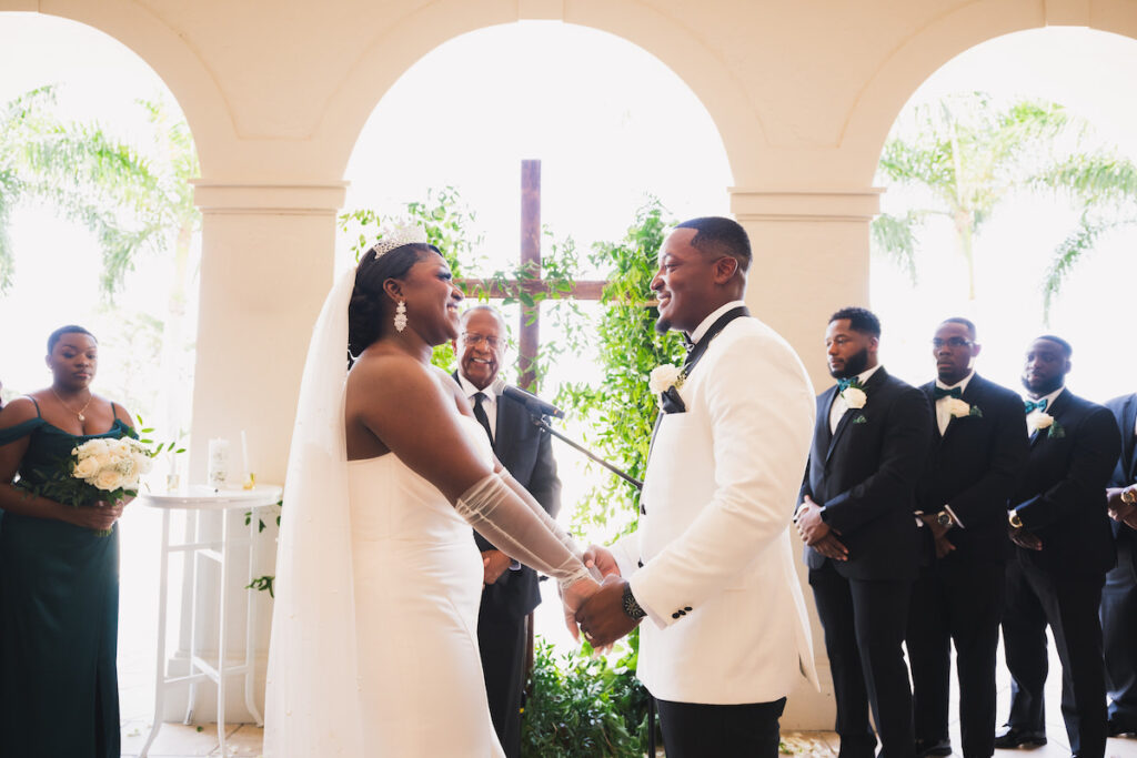 Milan and Mischael's traditional summer wedding in Florida featured an elegant, polished style and a classy black-and-white color palette!