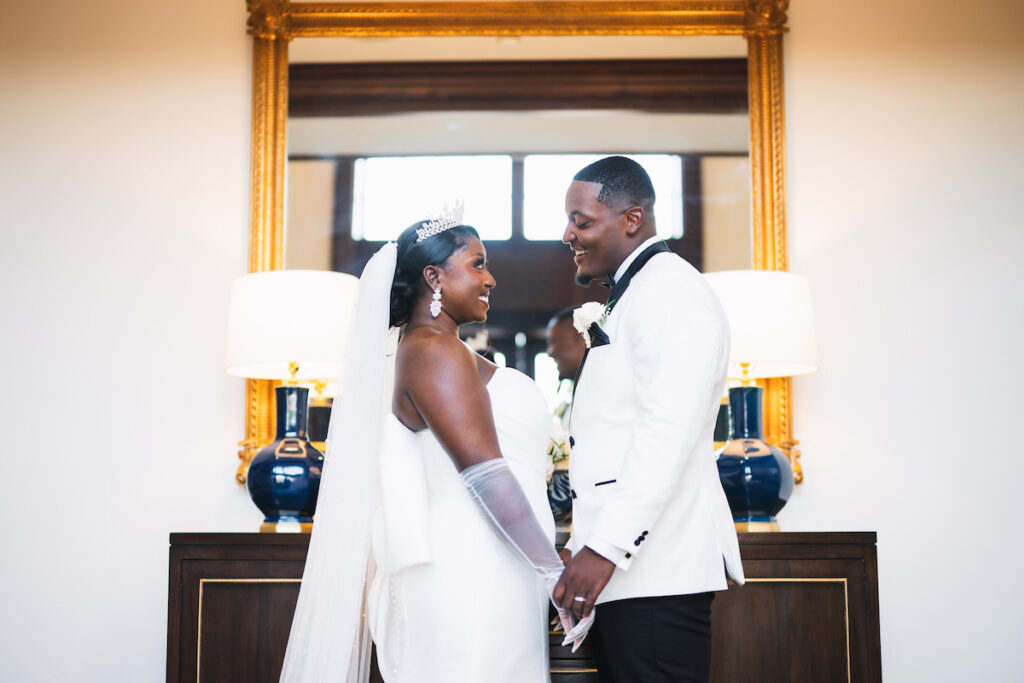 Milan and Mischael's traditional summer wedding in Florida featured an elegant, polished style and a classy black-and-white color palette!