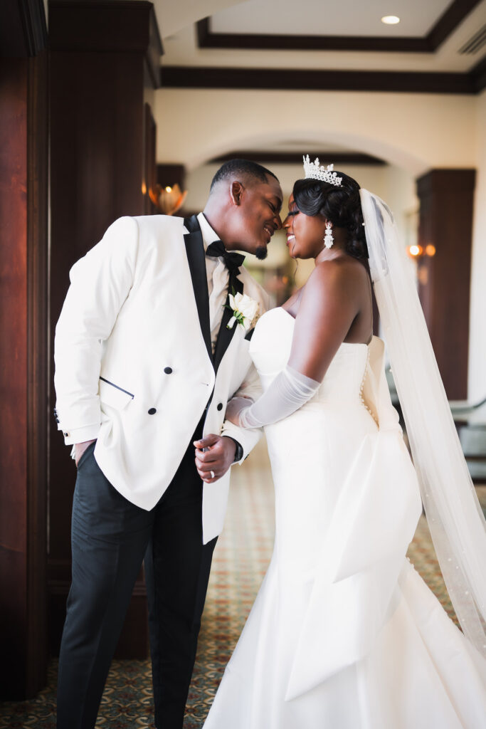 Milan and Mischael's traditional summer wedding in Florida featured an elegant, polished style and a classy black-and-white color palette!