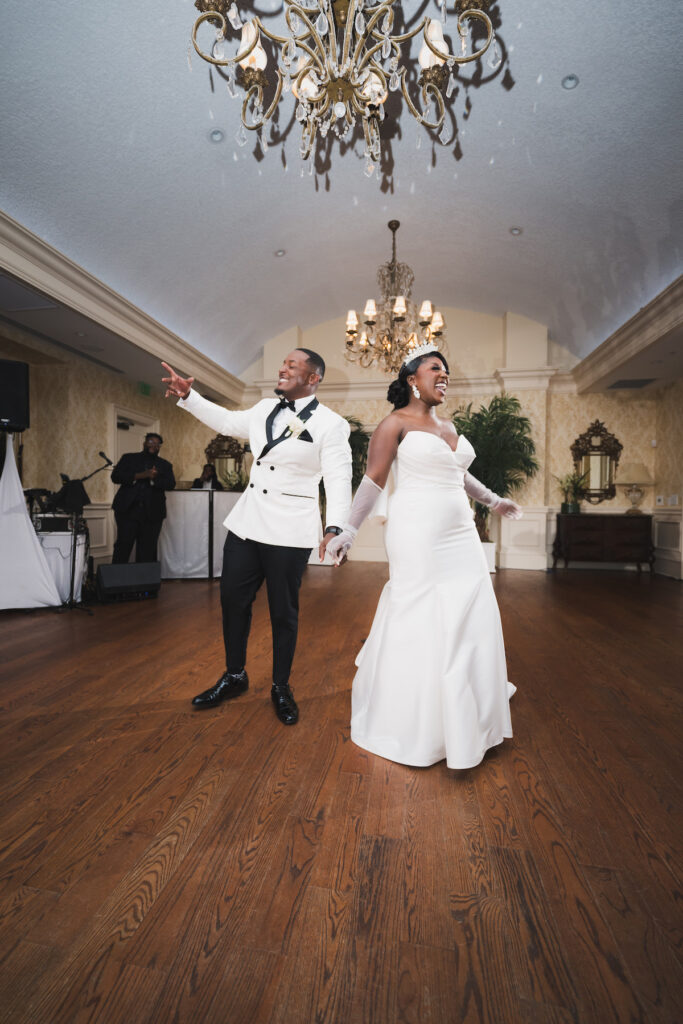 Milan and Mischael's traditional summer wedding in Florida featured an elegant, polished style and a classy black-and-white color palette!