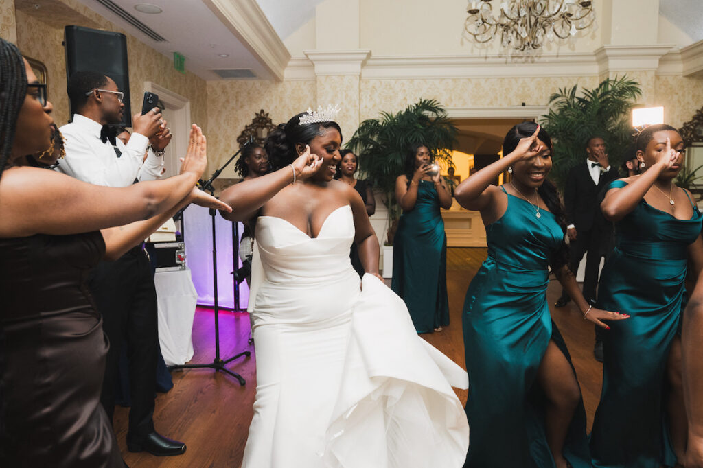 Milan and Mischael's traditional summer wedding in Florida featured an elegant, polished style and a classy black-and-white color palette!