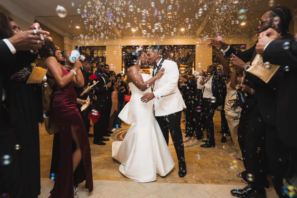 Milan and Mischael's traditional summer wedding in Florida featured an elegant, polished style and a classy black-and-white color palette!