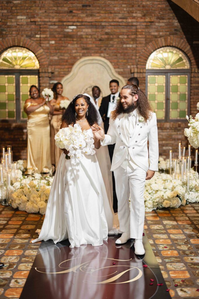 From their holiday party meet cute to partying down the aisle, Dawntavia and Fernando's luxurious Miami wedding was the day of their dreams!