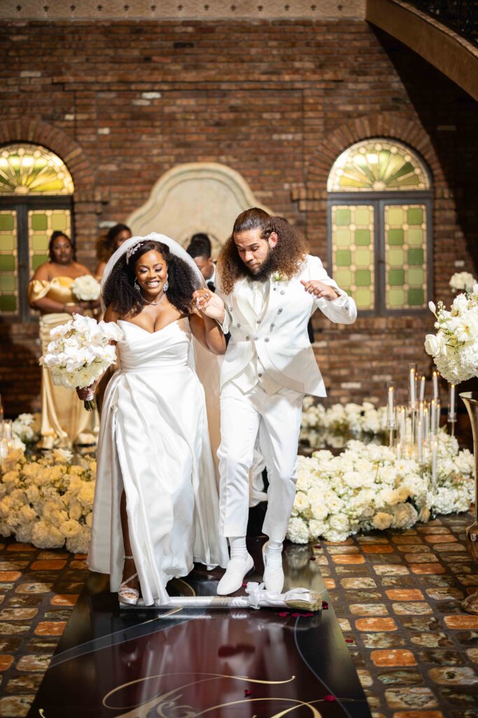 From their holiday party meet cute to partying down the aisle, Dawntavia and Fernando's luxurious Miami wedding was the day of their dreams!