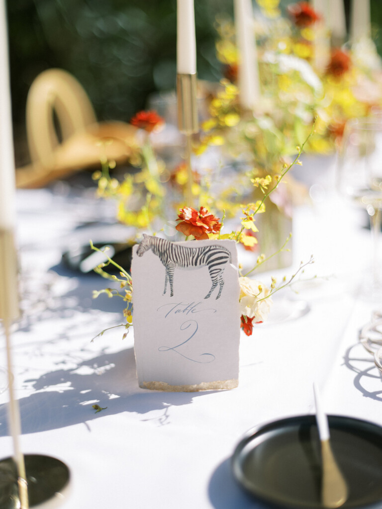 Featured in Issue 30, love transcends words in this elegant styled shoot on Amelia Island inspired by African Royalty.