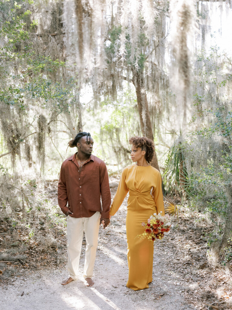 Featured in Issue 30, love transcends words in this elegant styled shoot on Amelia Island inspired by African Royalty.