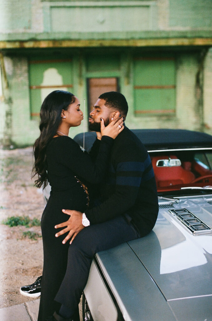 Jojo and Clyde's modern and sexy engagement shoot had a vintage vibe with a classic car and a laid-back in-studio portrait session that perfectly captured the fun-loving couple leading up to their summer wedding.