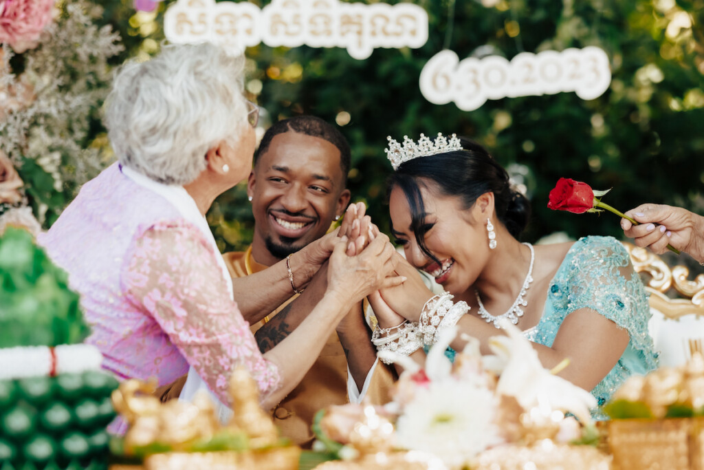 Featured in MunaLuchi Bride Magazine, Issue 31, Ray and Sidtia's two-day wedding in California celebrates Cambodian culture with gorgeous cultural attire, colorful floral designs, and a stunning all-white wedding.