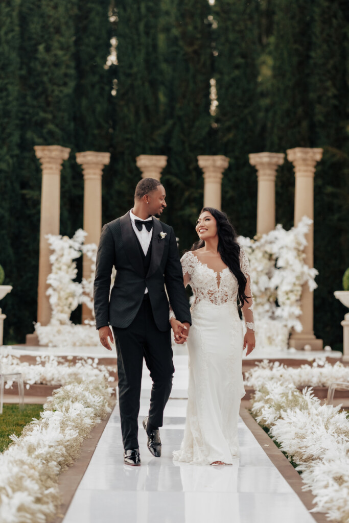 Featured in MunaLuchi Bride Magazine, Issue 31, Ray and Sidtia's two-day wedding in California celebrates Cambodian culture with gorgeous cultural attire, colorful floral designs, and a stunning all-white wedding.