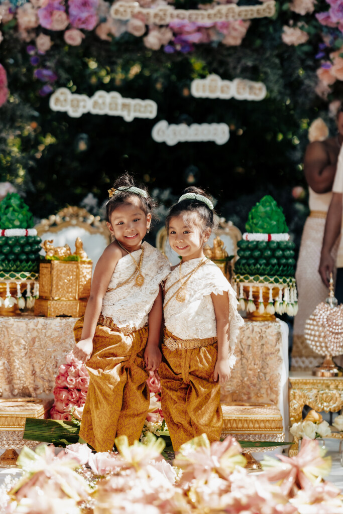 Featured in MunaLuchi Bride Magazine, Issue 31, Ray and Sidtia's two-day wedding in California celebrates Cambodian culture with gorgeous cultural attire, colorful floral designs, and a stunning all-white wedding.