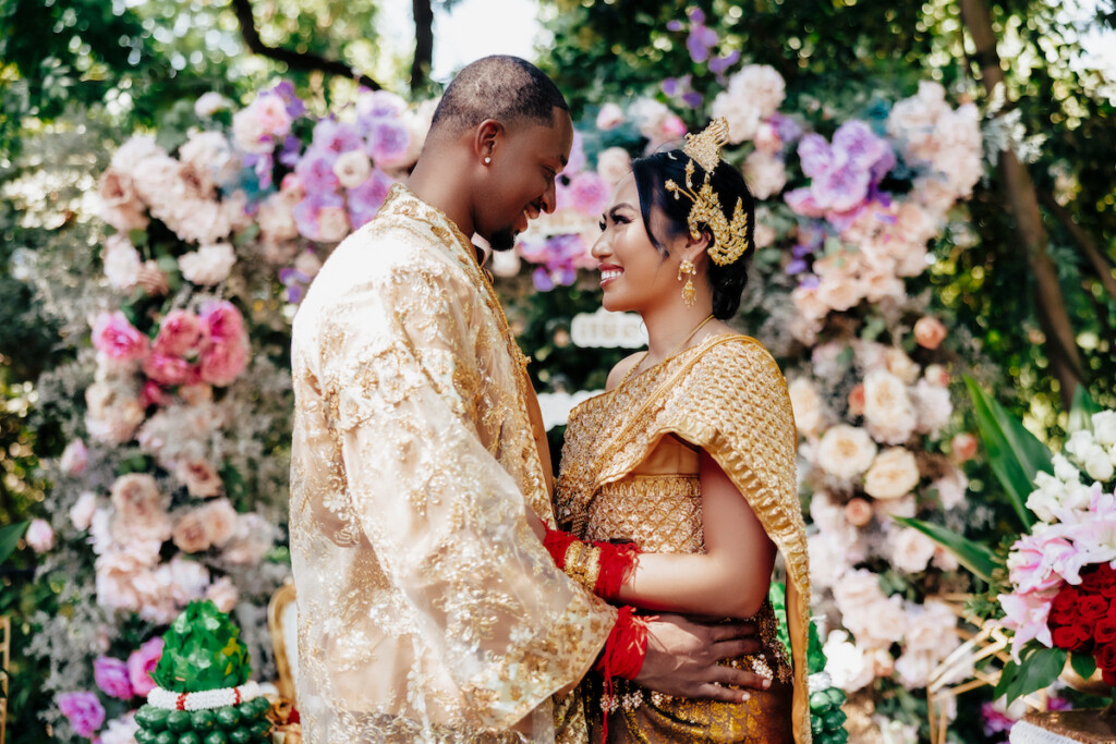 Featured in MunaLuchi Bride Magazine, Issue 31, Ray and Sidtia's two-day wedding in California celebrates Cambodian culture with gorgeous cultural attire, colorful floral designs, and a stunning all-white wedding.