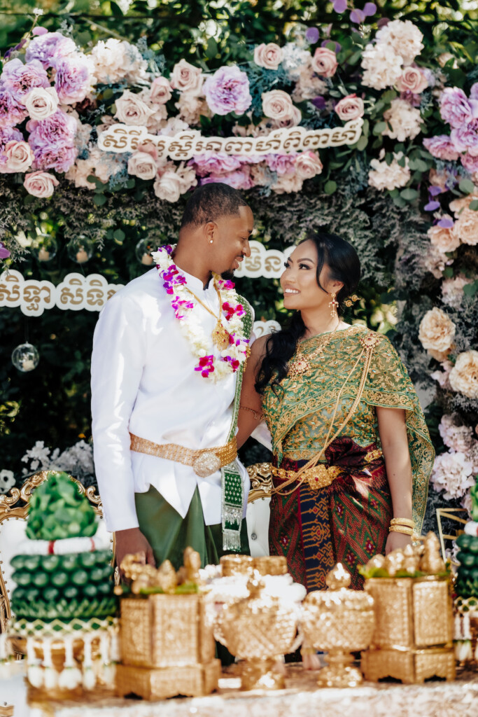 Featured in MunaLuchi Bride Magazine, Issue 31, Ray and Sidtia's two-day wedding in California celebrates Cambodian culture with gorgeous cultural attire, colorful floral designs, and a stunning all-white wedding.