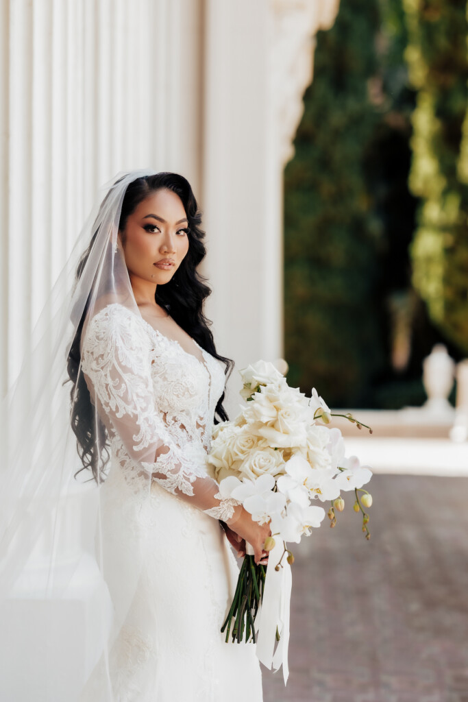 Featured in MunaLuchi Bride Magazine, Issue 31, Ray and Sidtia's two-day wedding in California celebrates Cambodian culture with gorgeous cultural attire, colorful floral designs, and a stunning all-white wedding.